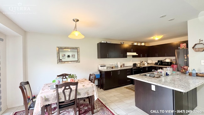 Building Photo - 1-547 Windfields Farm Dr W