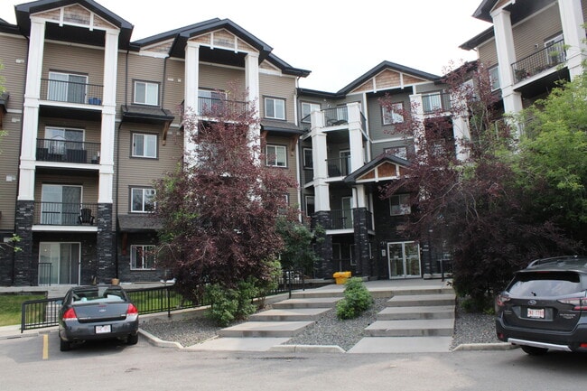 Building Photo - Cozy 1-Bedroom Main Floor Condo with Patio...