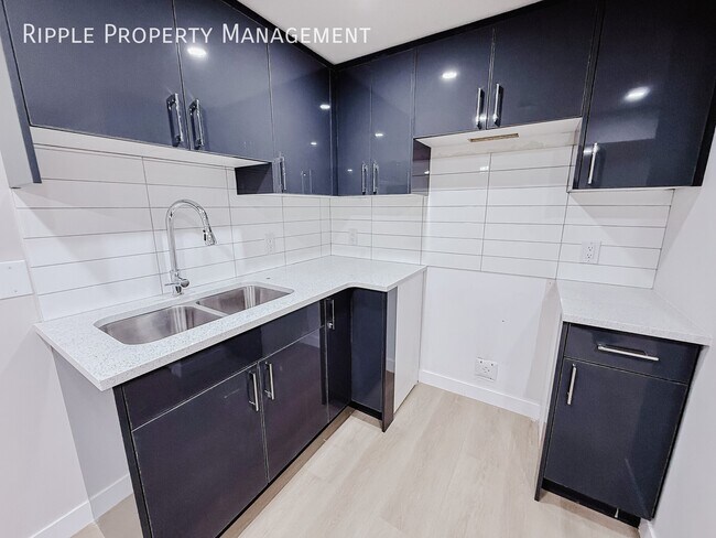 Building Photo - NEWLY RENOVATED 3 BEDS, 1 BATHS LOWER UNIT