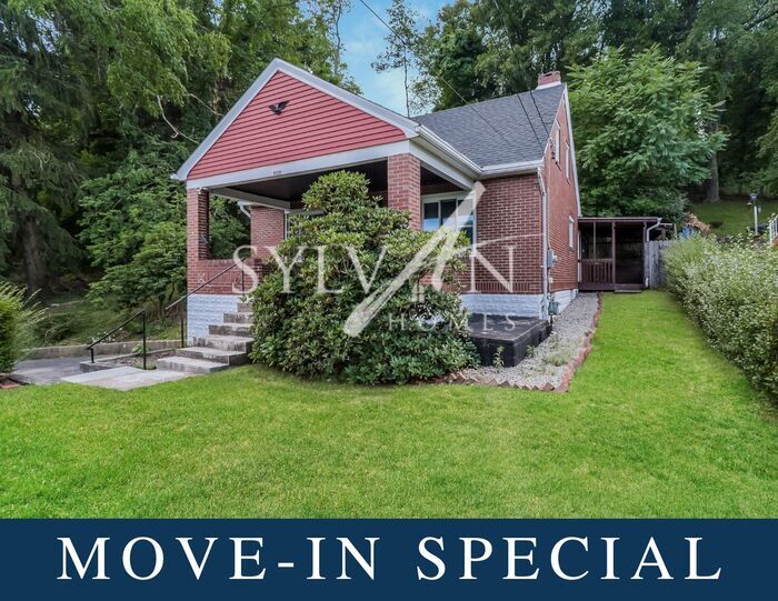 Primary Photo - The living is easy in this 3 bedroom, 2 ba...