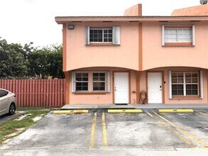 Building Photo - 9837 W Okeechobee Rd