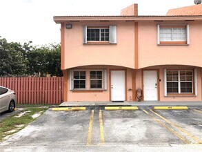 Building Photo - 9837 W Okeechobee Rd