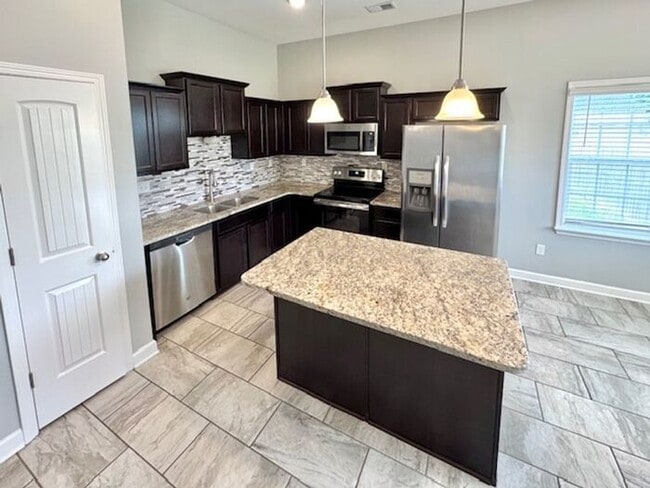 Building Photo - Now Leasing A Brand New 5 Bedroom 3 Bath H...