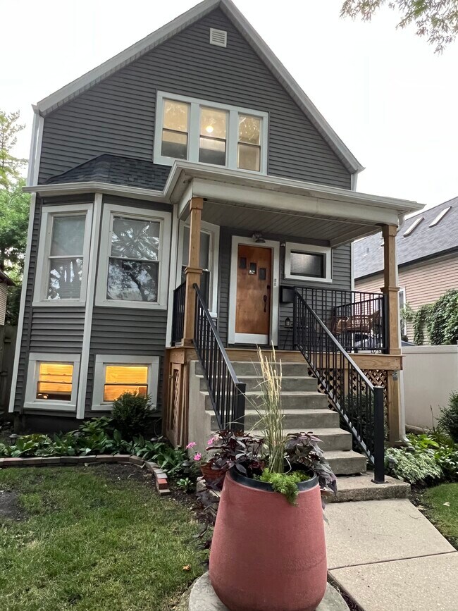 Top floor of two-story house - 4108 N Lawndale Ave