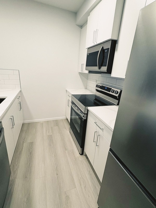 Photo du bâtiment - 7729-174A 174A Ave NW