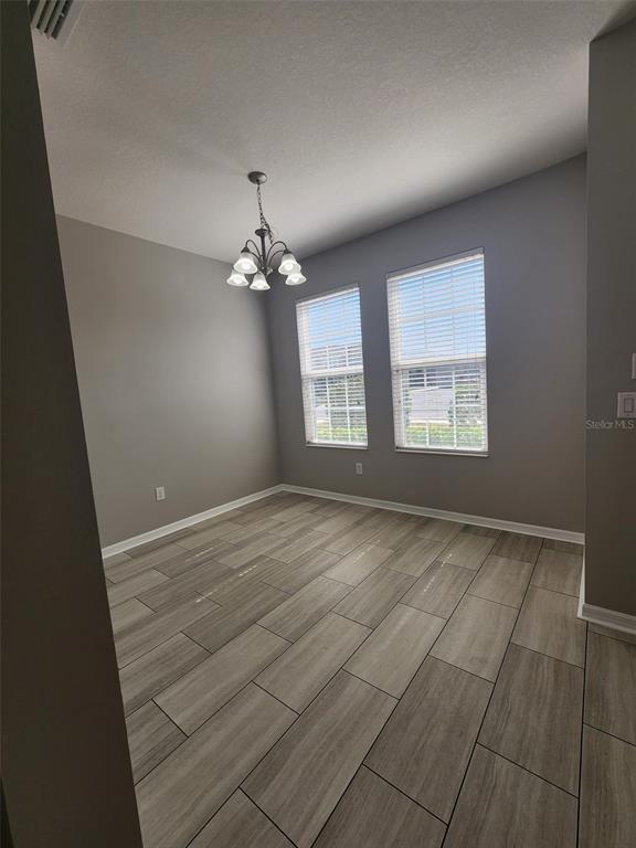 Building Photo - 7010 Spotted Deer Pl