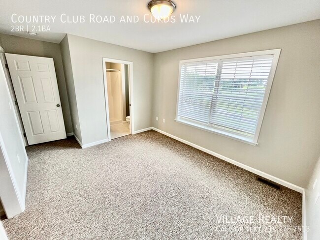 Building Photo - Spacious 2 bed, 2.5 bath Townhome with Gar...