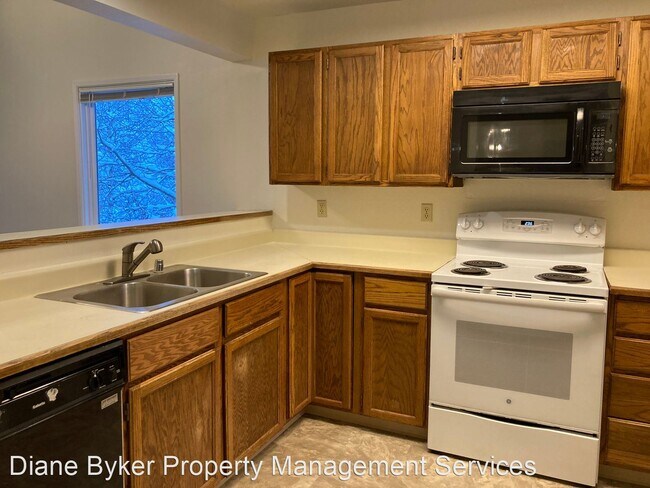 Building Photo - 2 br, 2 bath House - 5620 E. 40th Ave #C303