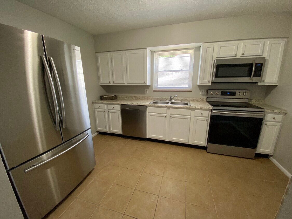 New stainless steel appliances! - 824 9th Ave