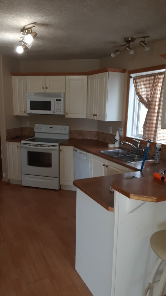 Photo du bâtiment - 3 Bed 2 Bath Unit in Blackfalds, AB
