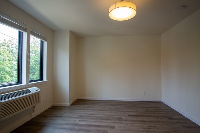 Building Photo - John's Landing-Modern, Spacious Studio Liv...