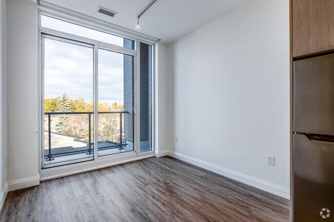 1BR + Den, 1BA - 561SF - Living Room - Bloom