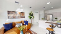 Located at 1451 W 29th St in Hialeah, FL, this thoughtfully designed 2-bedroom, 2-bathroom residence offers a clean, modern aesthetic from entry to balcony. Gleaming marble-look porcelain tile flows seamlessly throughout every room, reflecting natural light and enhancing the bright, airy atmosphere that defines the space.

The open-concept living and kitchen area serves as the heart of the home. The kitchen is equipped with stainless steel appliances, including a full-size refrigerator, range, and built-in microwave, complemented by taupe cabinetry, white quartz countertops, and a peninsula that transitions smoothly into the living area.

Both bedrooms are generously proportioned, flooded with natural light through large windows, and include dedicated closet space. The primary bedroom features a private balcony with sliding glass doors, extending the living space outdoors. A second balcony provides additional outdoor access, ideal for enjoying the South Florida climate.

The two bathrooms echo the home's clean design language, featuring light cabinetry, marble-look tile, and well-lit vanity mirrors. One bathroom includes a full tub and shower combination. Additional highlights include a dedicated laundry area and three closets, offering exceptional storage throughout. The overall ambiance is modern, light-filled, and move-in ready.