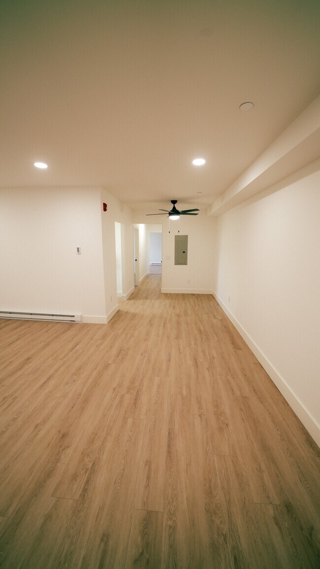 Wide view of living and dining space - Southgate Gardens Apartments