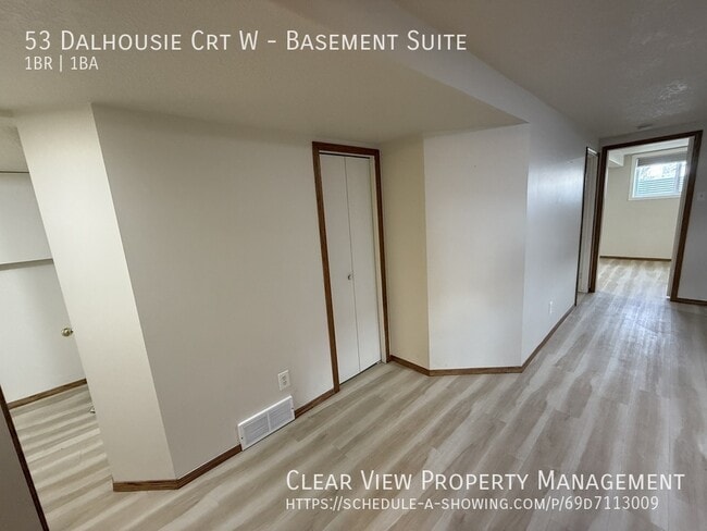 Building Photo - Bright 1-bedroom plus office lower-level suite with fully fenced yard and Utilities Included!
