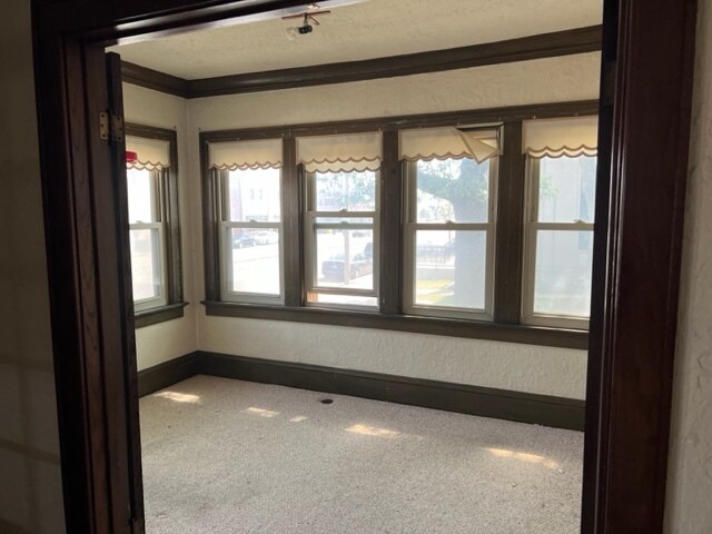 Sun Room - 1701 W National Ave