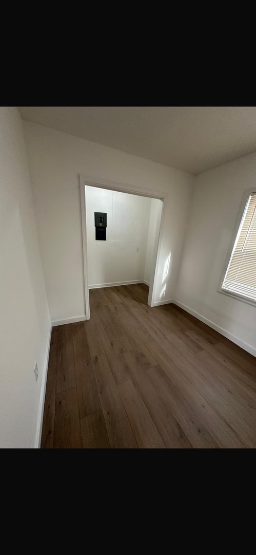 Building Photo - This is a 4 bedroom 1 bathroom house it has a spacious living room and full kitchen that comes wi...