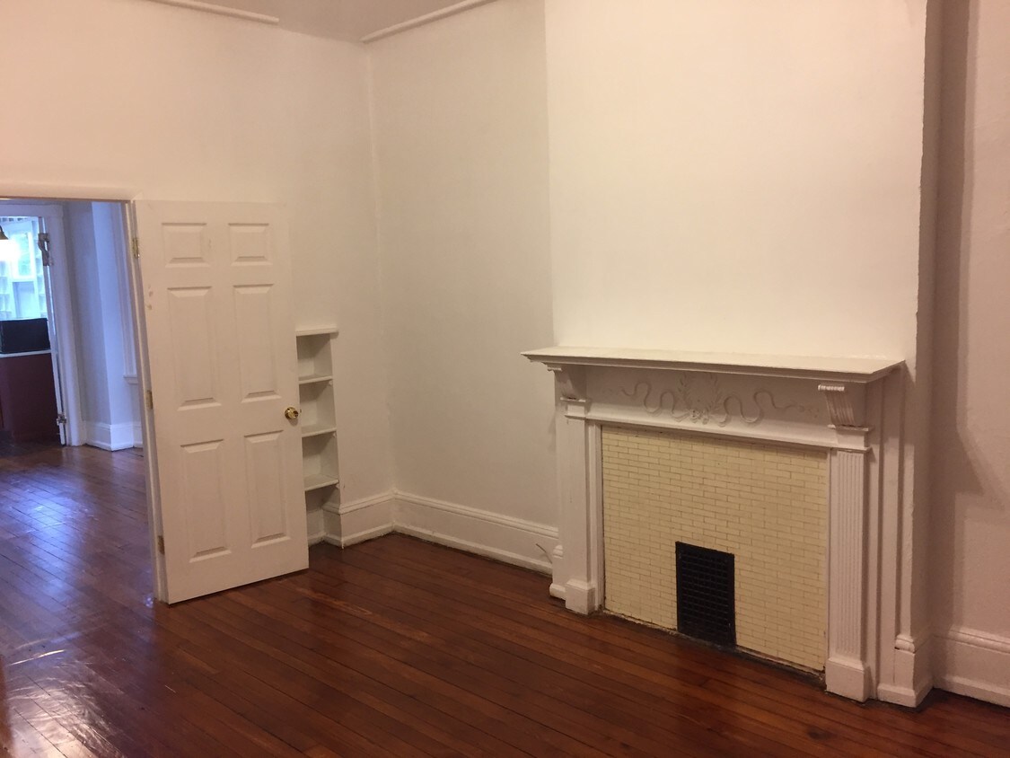 Front room with built-in bookcases - 4817 Walton Ave