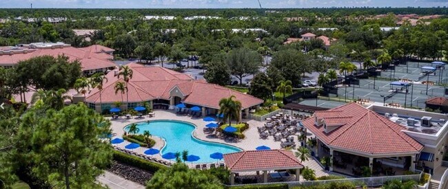 Building Photo - ** Calling all Golf Enthusiasts ** Turn-Key 2 Bedroom + Den | 2 Bath Condo with Golf Course & Wat...