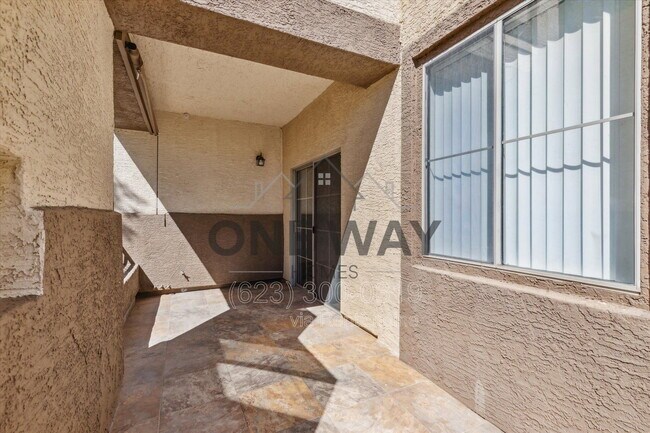 Foto del edificio - 10136 E Southern Ave