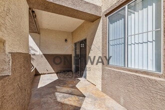 Building Photo - 10136 E Southern Ave