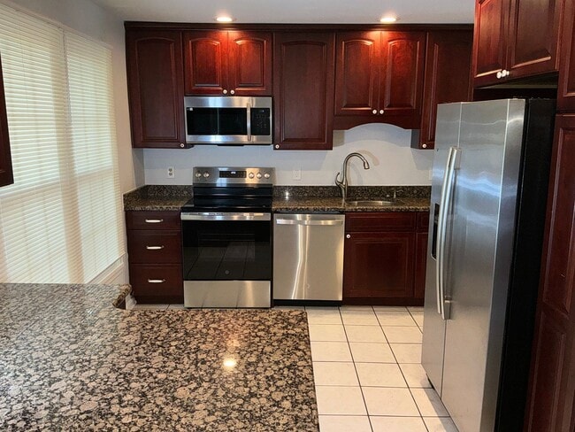Photo - Very well maintained 3BR 3.5BA 3 level Colonial Townhome with fully fenced yard