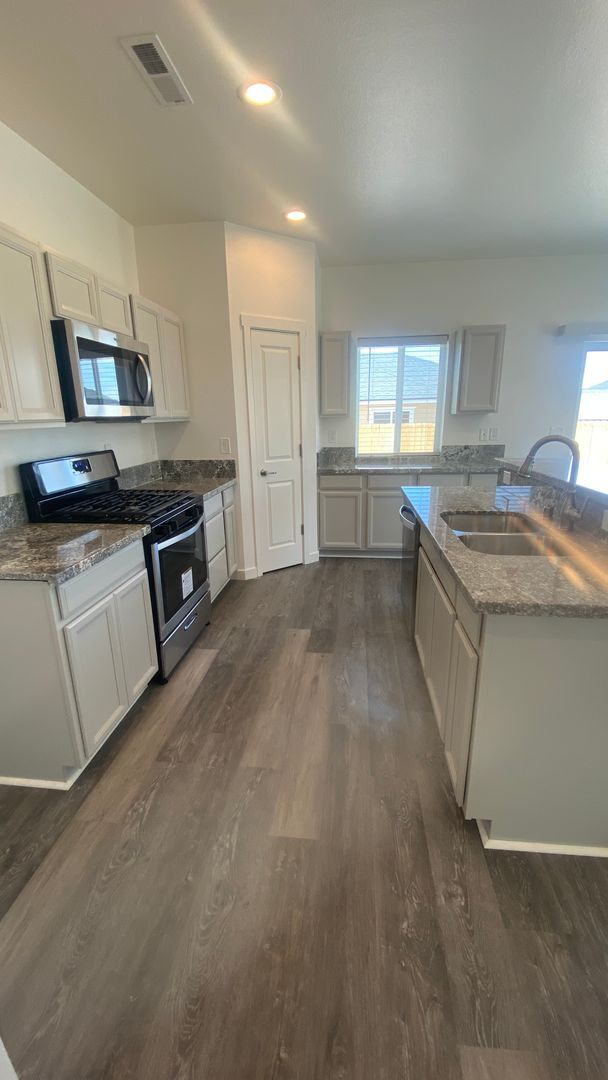 Building Photo - Brand new home with LVP flooring t/o, gran...