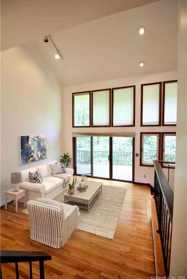 Formal living room with sunken fireplace nook - 135 Valley Brook Terrace