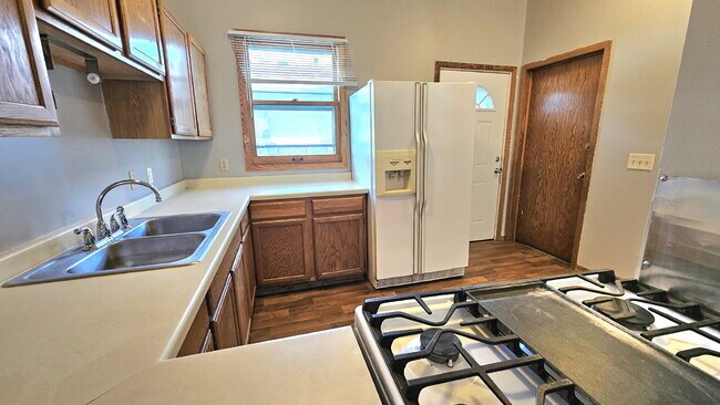 Foto del edificio - "Charming 3-Bedroom Retreat with 1200 Sq Ft of Comfort in Harrison Neighborhood in Minneapolis!"