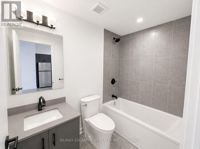 Photo du bâtiment - 4878 Powers Cmn