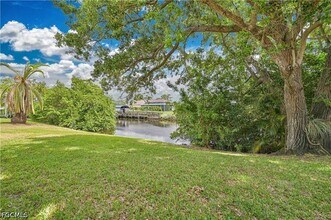 Building Photo - 15080 Riverbend Blvd