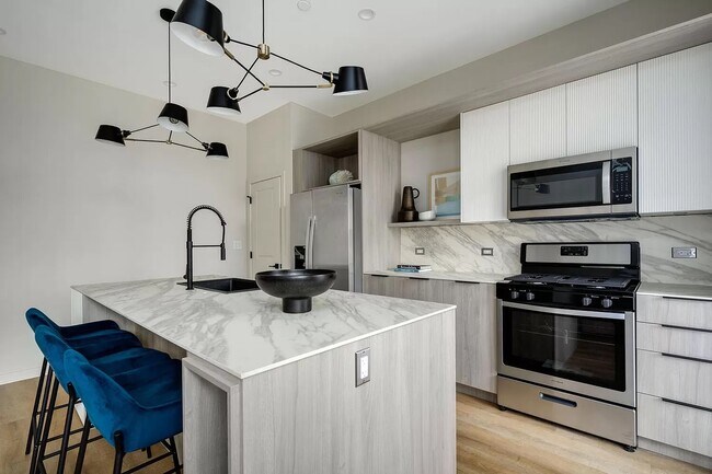 Foto del edificio - 3153 N Tripp Ave