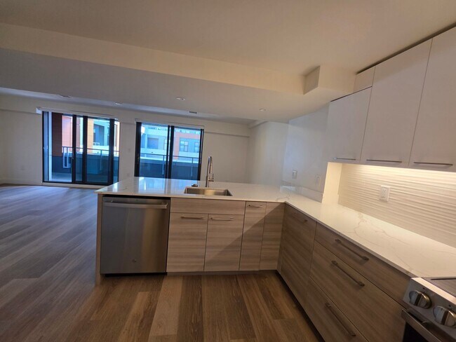 Foto del edificio - No Brokers Fee Unit at Packard's Corner, Luxury Building. Concierge, Pool, Gym, In-Unit Washer an...
