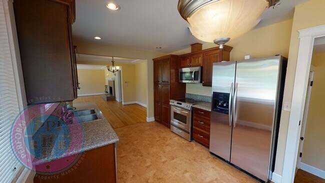 Building Photo - Remodeled Kitchen with Stainless Appliance...