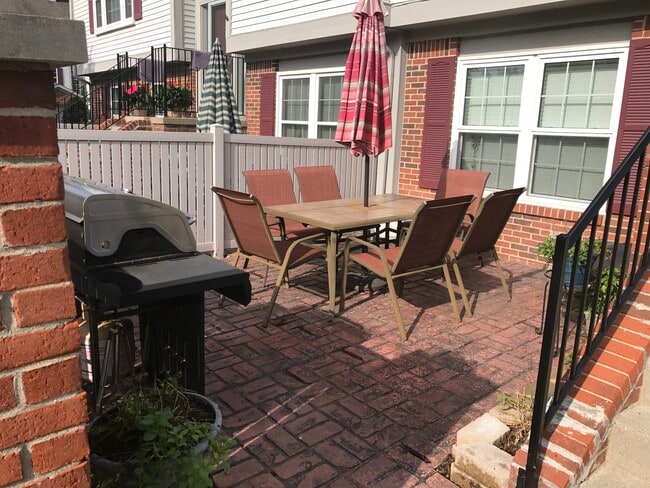 Large brick patio perfect for grilling and relaxing - 49730 Plymouth Way