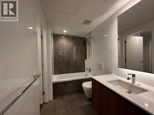 Building Photo - 389 W 59th Ave