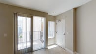 Located at 1907 Columbia, Unit #503 in San Diego, this well-appointed residence offers a thoughtfully designed single-floor layout with clean, modern finishes throughout. The entryway welcomes you with light tile flooring and a sliding glass door that opens to a private balcony, filling the space with abundant natural light.

The open-concept living and dining area flows seamlessly from the entry, featuring the same light tile flooring, neutral-toned walls, and a stylish pendant light fixture that anchors the space. The kitchen is equipped with warm-toned wood cabinetry, granite countertops, a breakfast bar peninsula, and a full suite of stainless steel appliances including a gas range, microwave, dishwasher, and refrigerator — all illuminated by recessed lighting.

The bedroom offers plush carpet flooring, soft neutral walls, and a ceiling fan, creating a comfortable and restful environment. The bathroom is finished with a granite-topped wood vanity, a large mirror, and a shower-tub combination, maintaining the consistent quality found throughout the unit.

Overall, the space presents a bright and cohesive aesthetic with practical finishes, ample storage, and a functional layout well-suited for comfortable everyday living in San Diego.