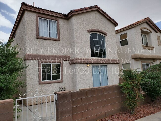 Building Photo - Gated~ 2 Bedroom Townhome w/2 Car Garage~M...