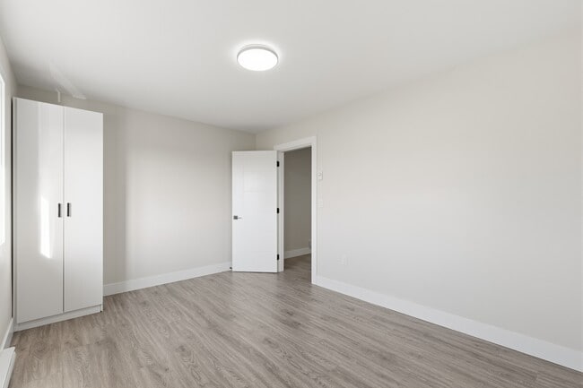 Building Photo - 15836-15856 56 Ave