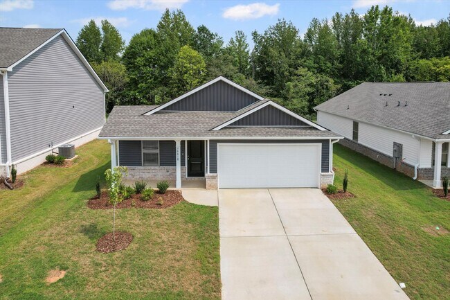 Building Photo - New 4BR Home in Whispering Woods – Spaciou...