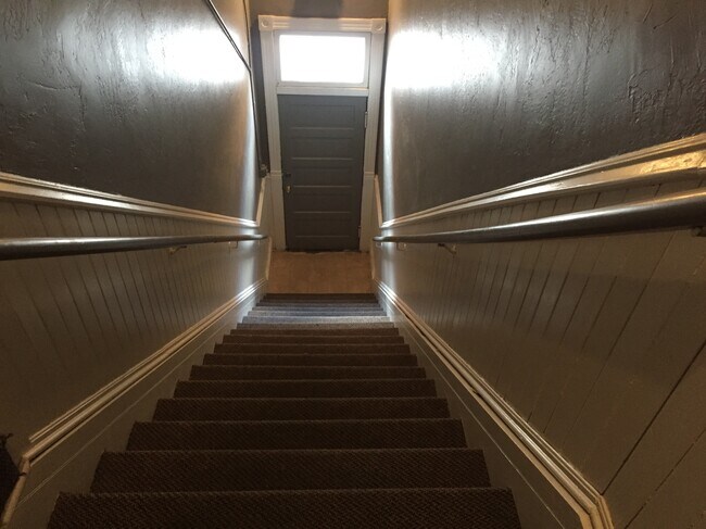 Stairs heading up to unit - 10 N Broadway