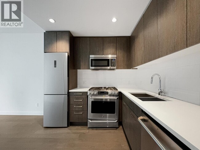 Building Photo - 9060-9060 University Crescent