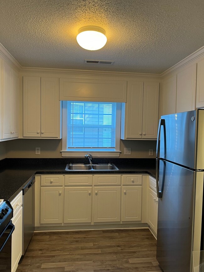 Kitchen with new stainless steel refrigerator - 2509 Saint Christopher Cir SW
