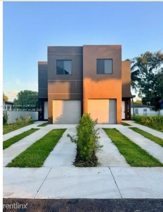 Building Photo - 3 br, 2.5 bath House - 1074 NW 61st St # A