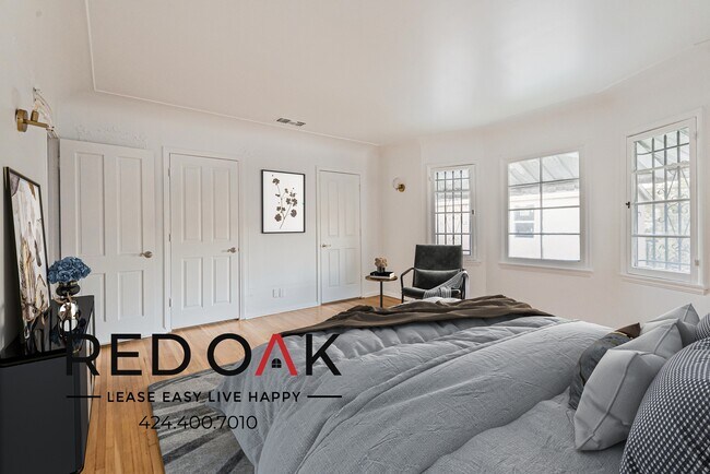 Building Photo - ~1 Month FREE~ Stunning and Spacious, Span...