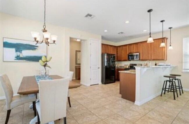 Open concept kitchen with dining room - 13857 Bridgewater Crossings Blvd