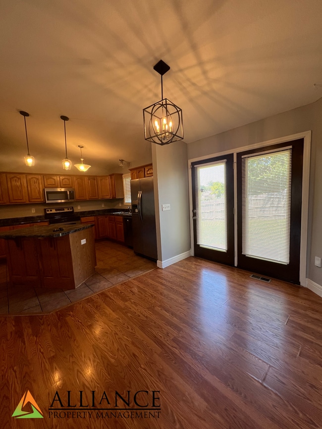 Building Photo - NEWLY PAINTED! Walk Out Basement & Much, Much More!