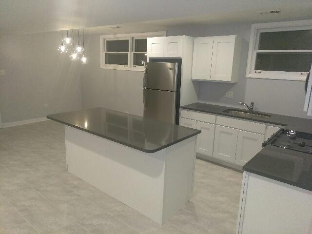 Building Photo - 6042 S Kolmar Ave