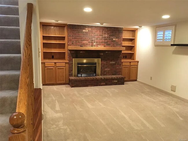 Full basement with electric fireplace - 11920 W Alameda Pky