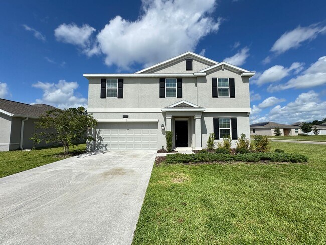 Foto del edificio - Elegant & Spacious 4-Bedroom Home with Bon...